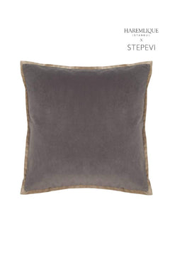 Gray velvet cushion with camel piping detail. Luxurious square pillow, perfect for adding a touch of elegance to your home