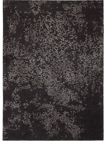 Primer plano de la alfombra «Blossom» en tonos titanio y gris guijarro, en el que muestra su motivo abstracto de inspiración floral. Ideal para habitaciones modernas thumbnail_1