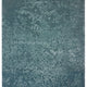 Close-up of the Blossom - Lagoon Blue rug. The abstract floral design adds a soft, subtle pattern to any space. thumbnail_1