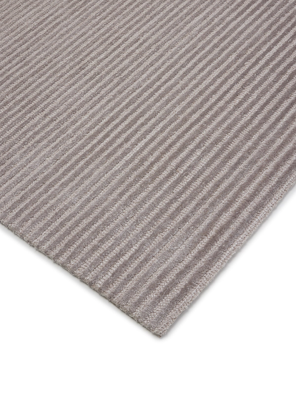 Close-up of a textured gray rug corner on a white background thumbnail_2