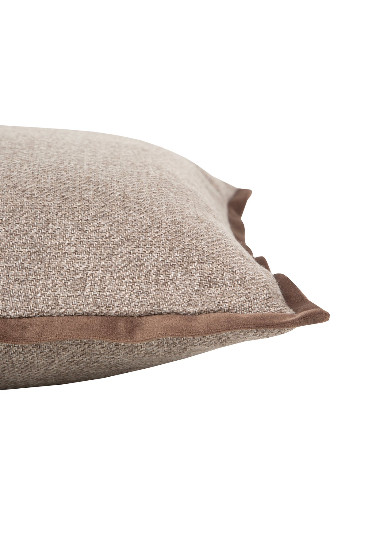 Close-up of a brown & brown woven throw pillow with velvet piping detail, perfect for adding texture to home decor.