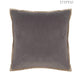 Gray velvet cushion with camel piping detail. Luxurious square pillow, perfect for adding a touch of elegance to your home