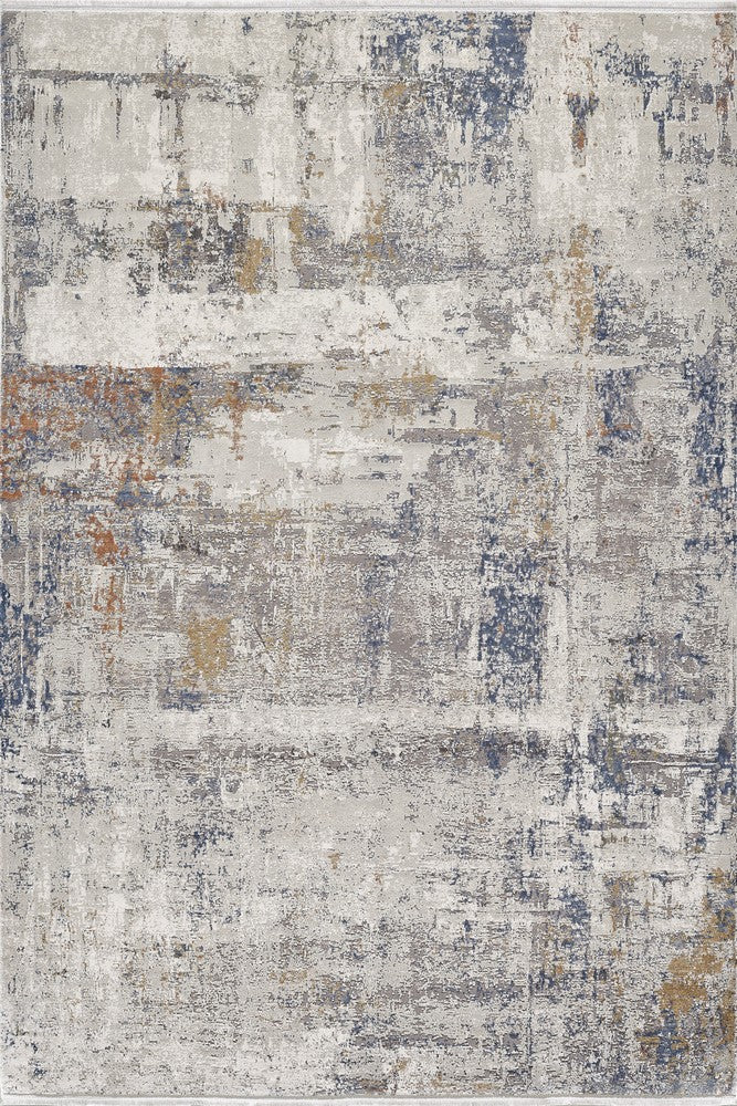 Textured abstract area rug displaying intricate patterns in beige, gray, blue and rust tones. Contemporary design accent.
