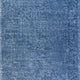 Close-up of the Blossom - Lagoon Blue rug. The abstract floral design adds a soft, subtle pattern to any space. thumbnail_1