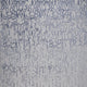 Pebble gray rug with a navy blue fade pattern; subtle, textured design for modern decor. thumbnail_1