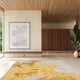 Interior scene showcasing the "Liz - Yellow" area rug with a golden, abstract design. Modern living room aesthetic. thumbnail_2