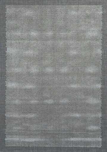 Primer plano de la alfombra «Scribble» en gris, que muestra su textura y sus sutiles variaciones de color; elemento decorativo para la habitación. thumbnail_1